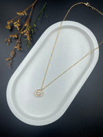 Celestial Orbit – Pearl-Inset Halo Pendant Necklace