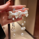 Celeste Bow & Pearl Dangle Earrings.