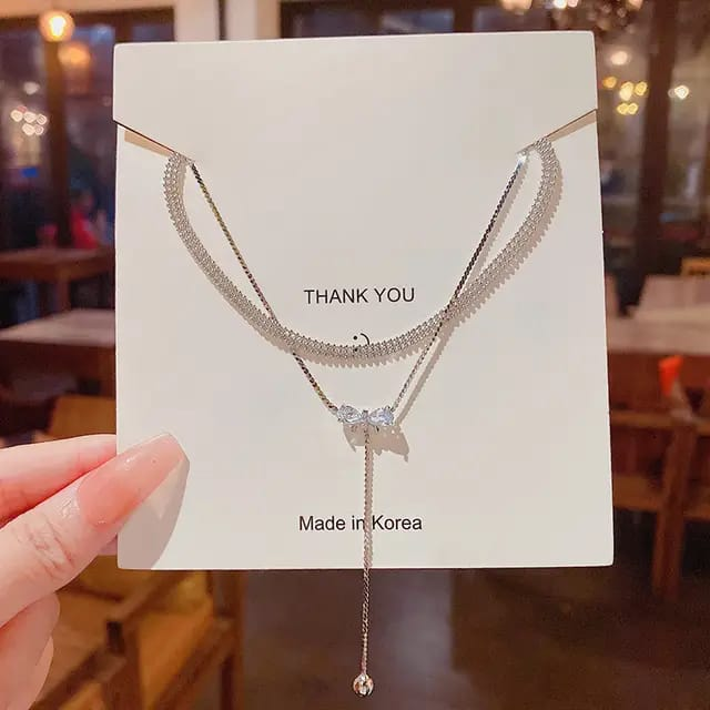 Aurora Twin Bow Pendant Necklace