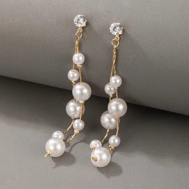 Celeste Strings – Floating Pearl Dangles