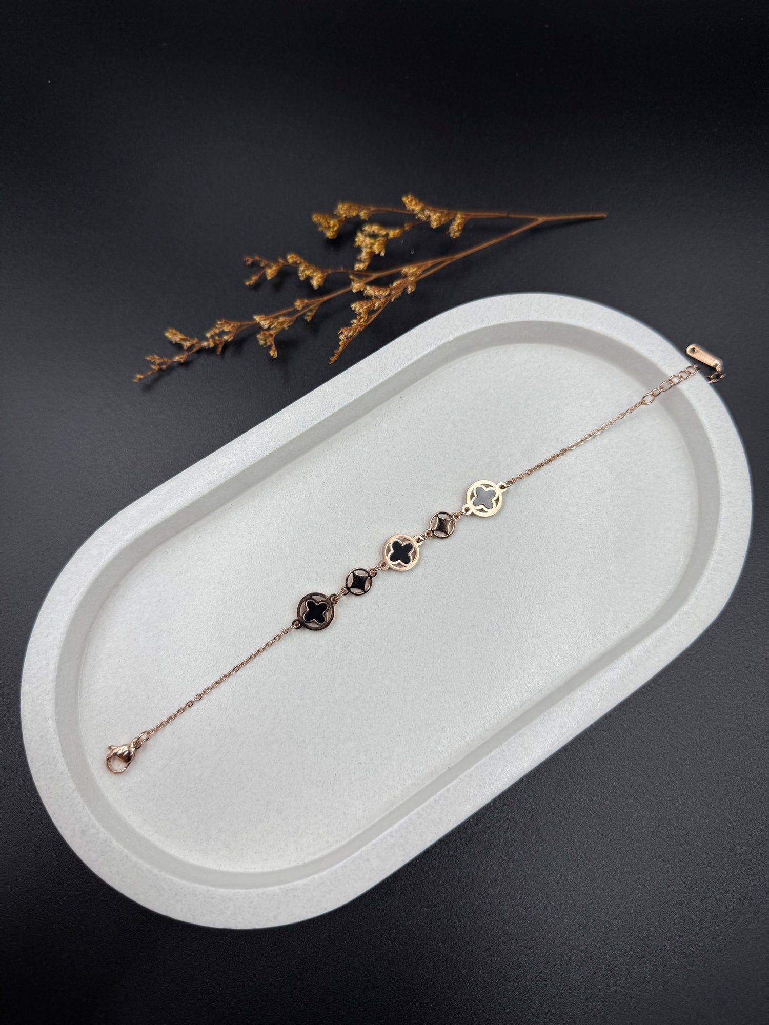 Rose Gold Clover Motif Bracelet with Black Enamel Charms