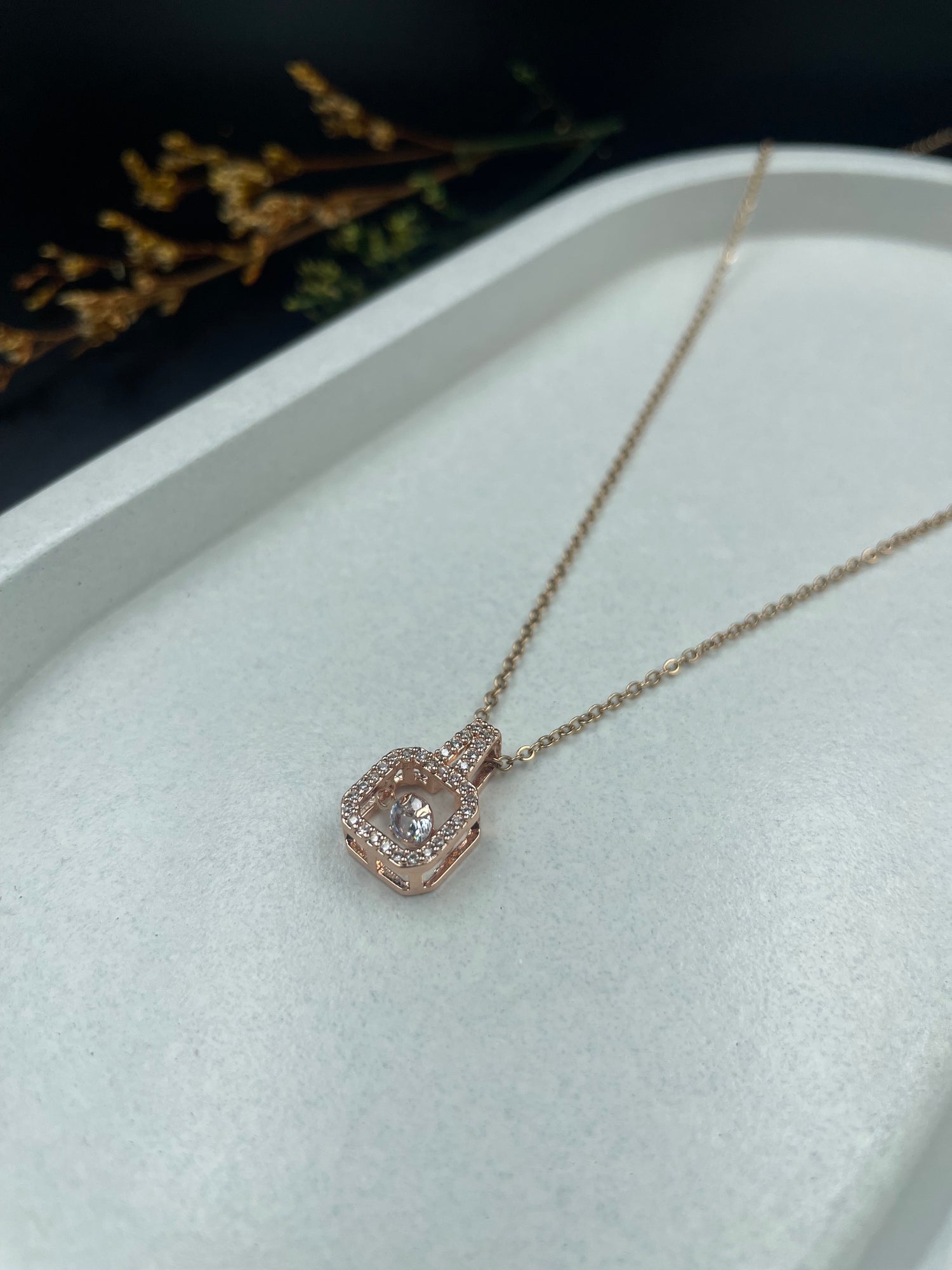 Luxe Prism – Rose Gold Geometric Halo Necklace