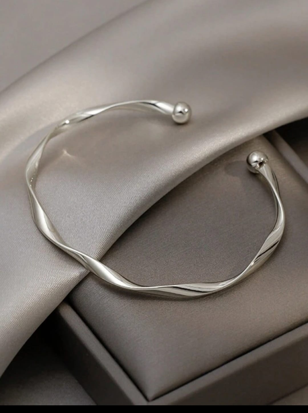 Sleek Twist Open Bangle – Silver Finish