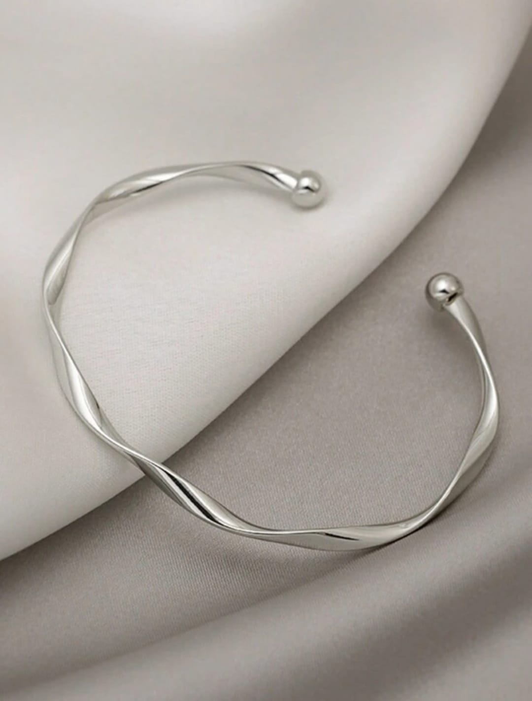 Sleek Twist Open Bangle – Silver Finish
